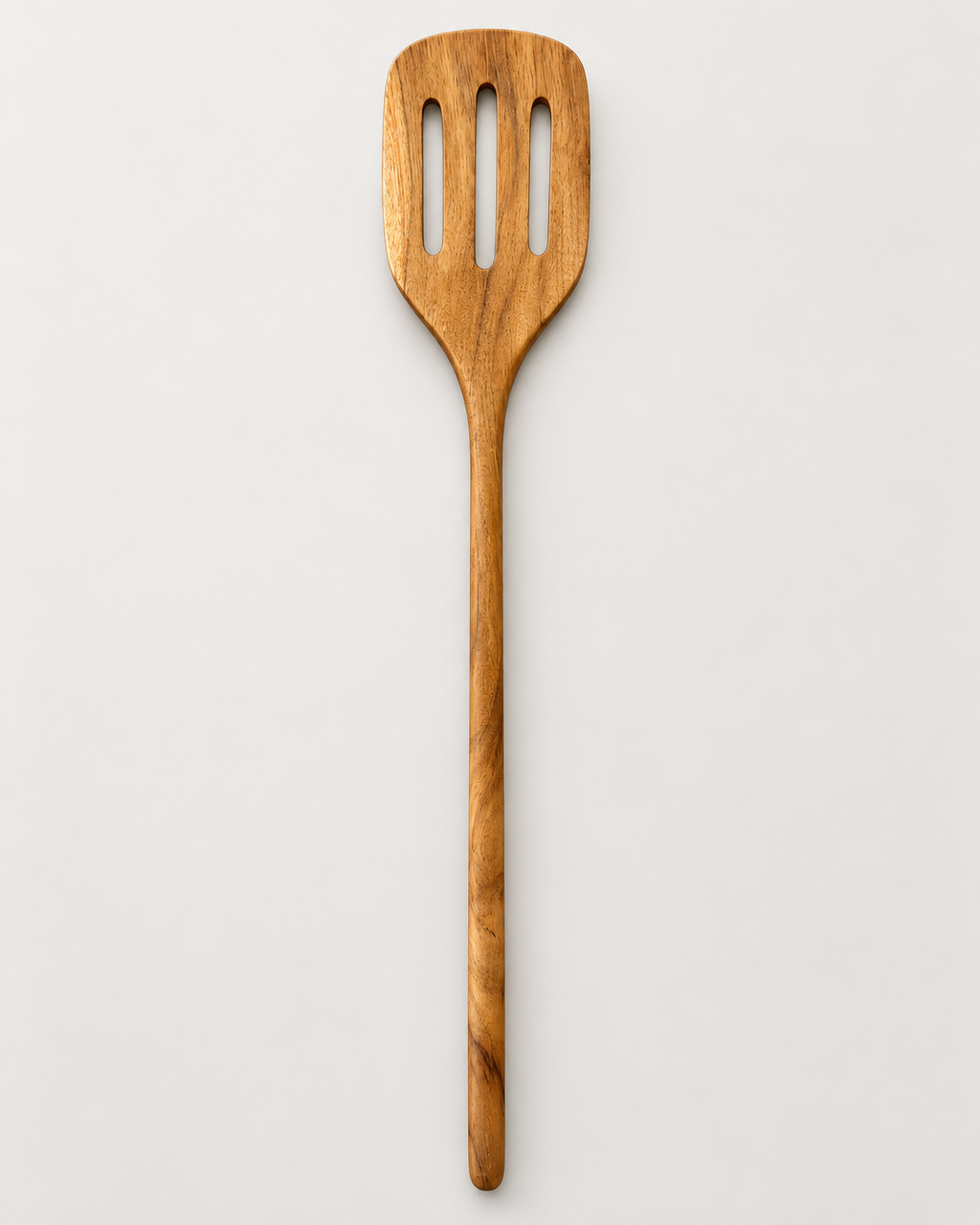 Spatule ajourée en bois de teck
