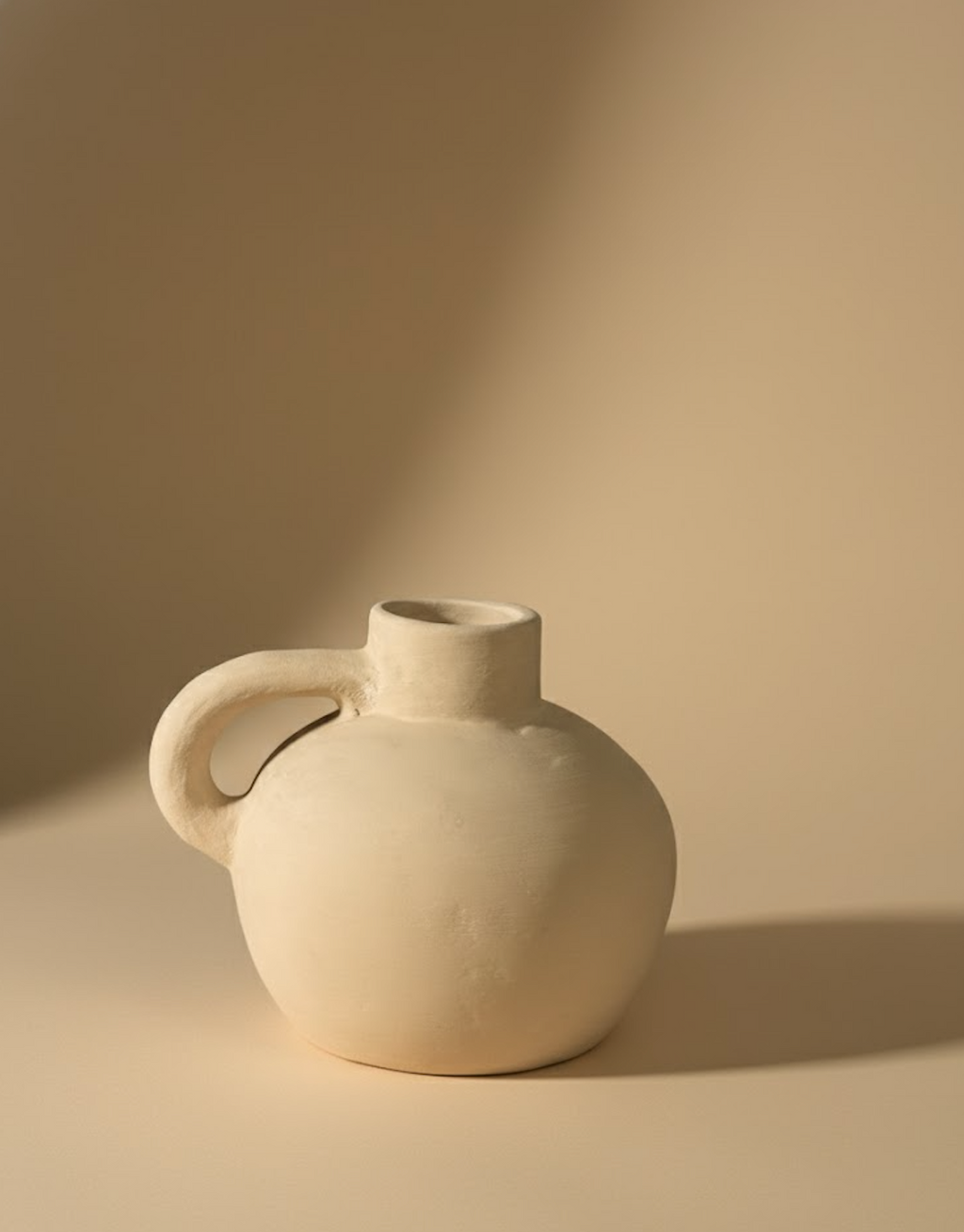 Vase rond avec poignée beige