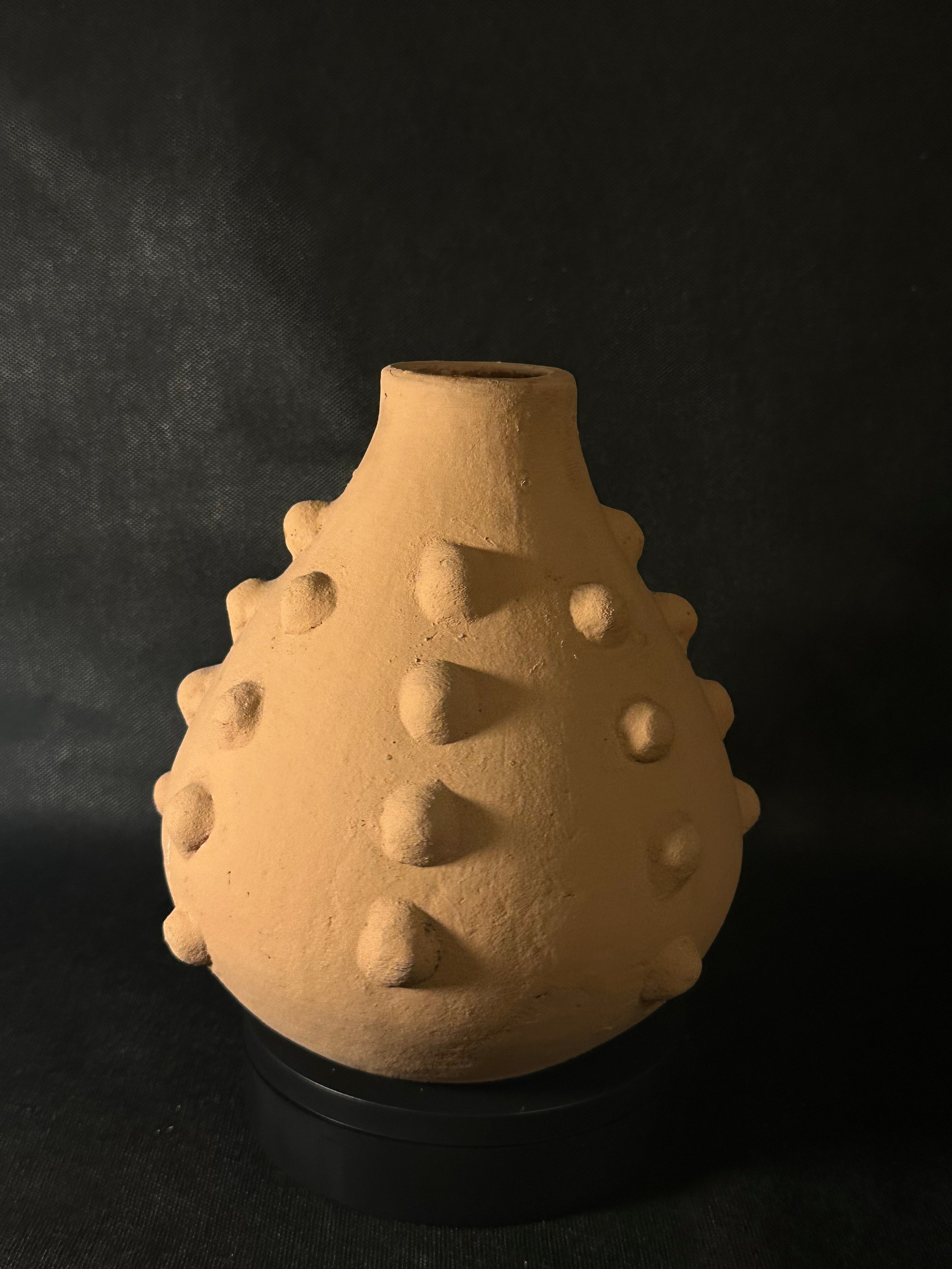 Vase orange texturé