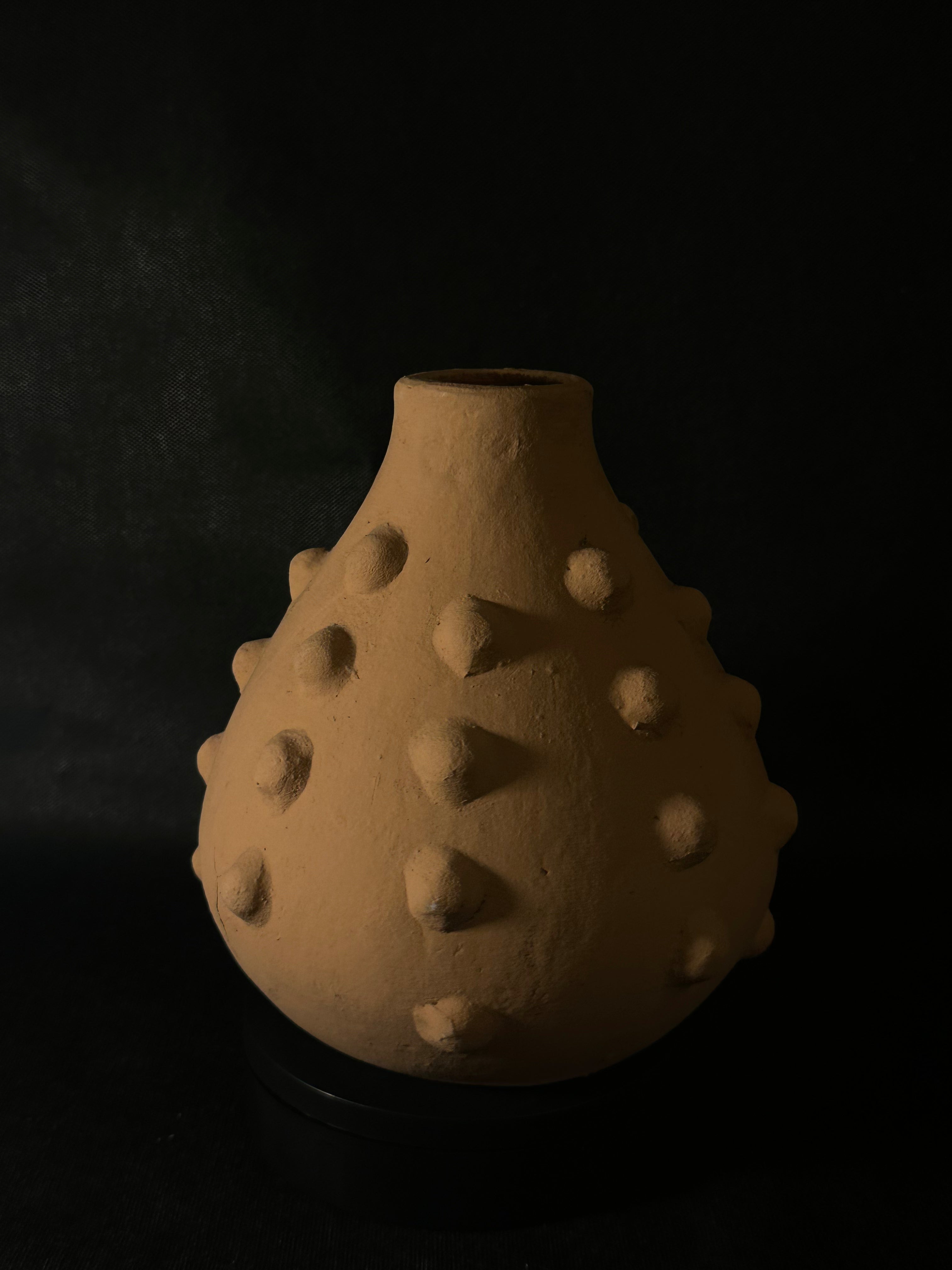 Vase orange texturé