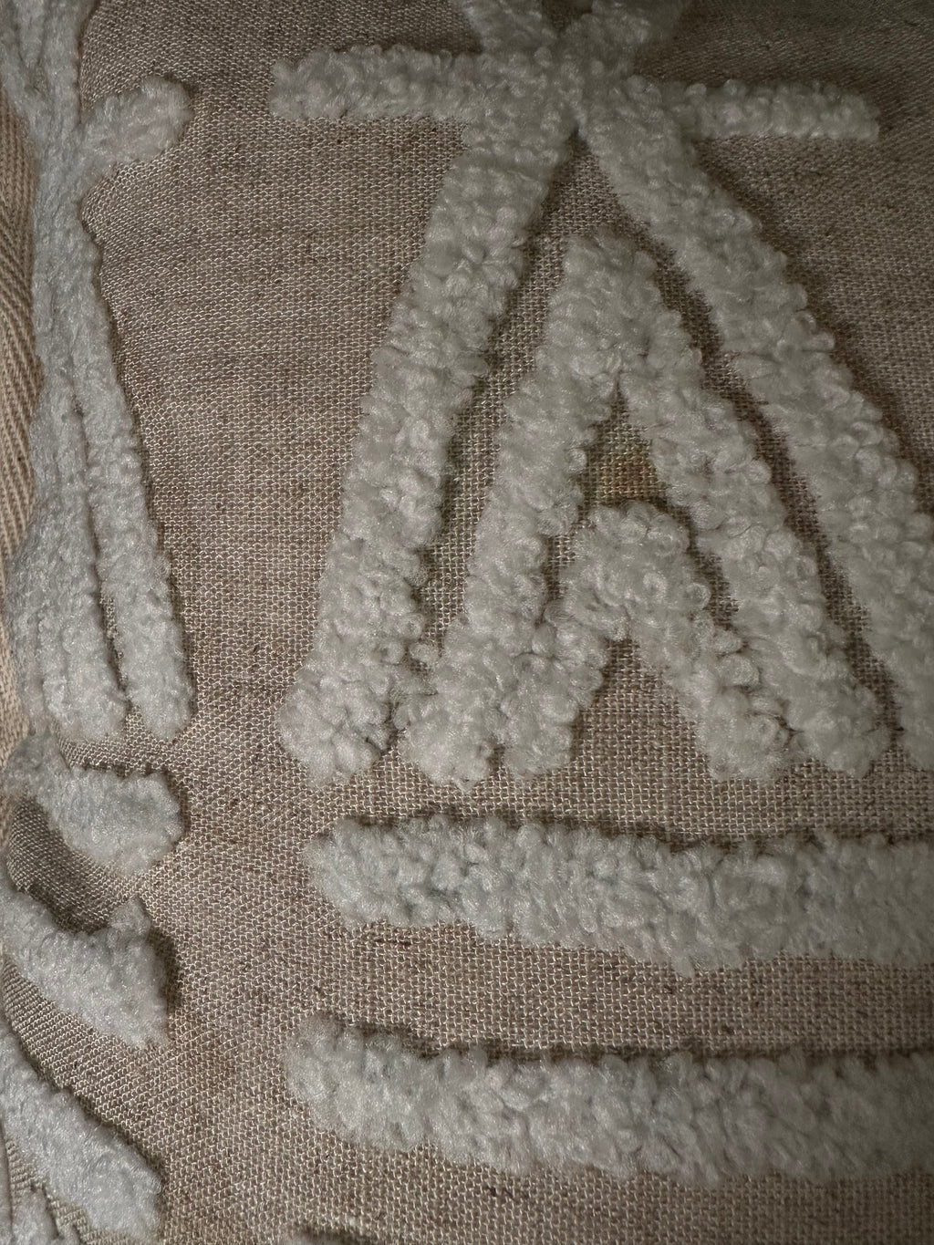 Taies de coussins beiges et blanches design