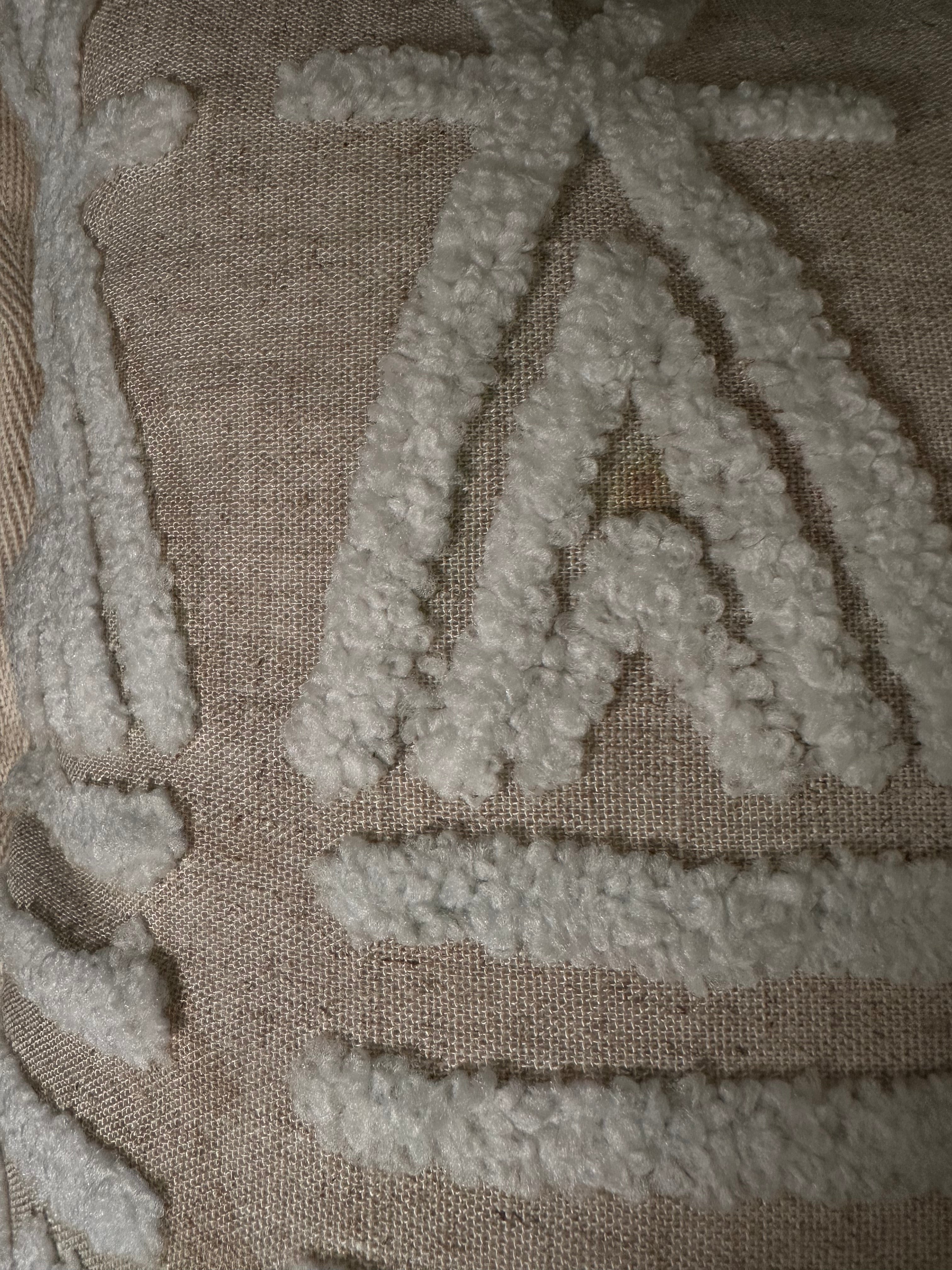 Taies de coussins beiges et blanches design