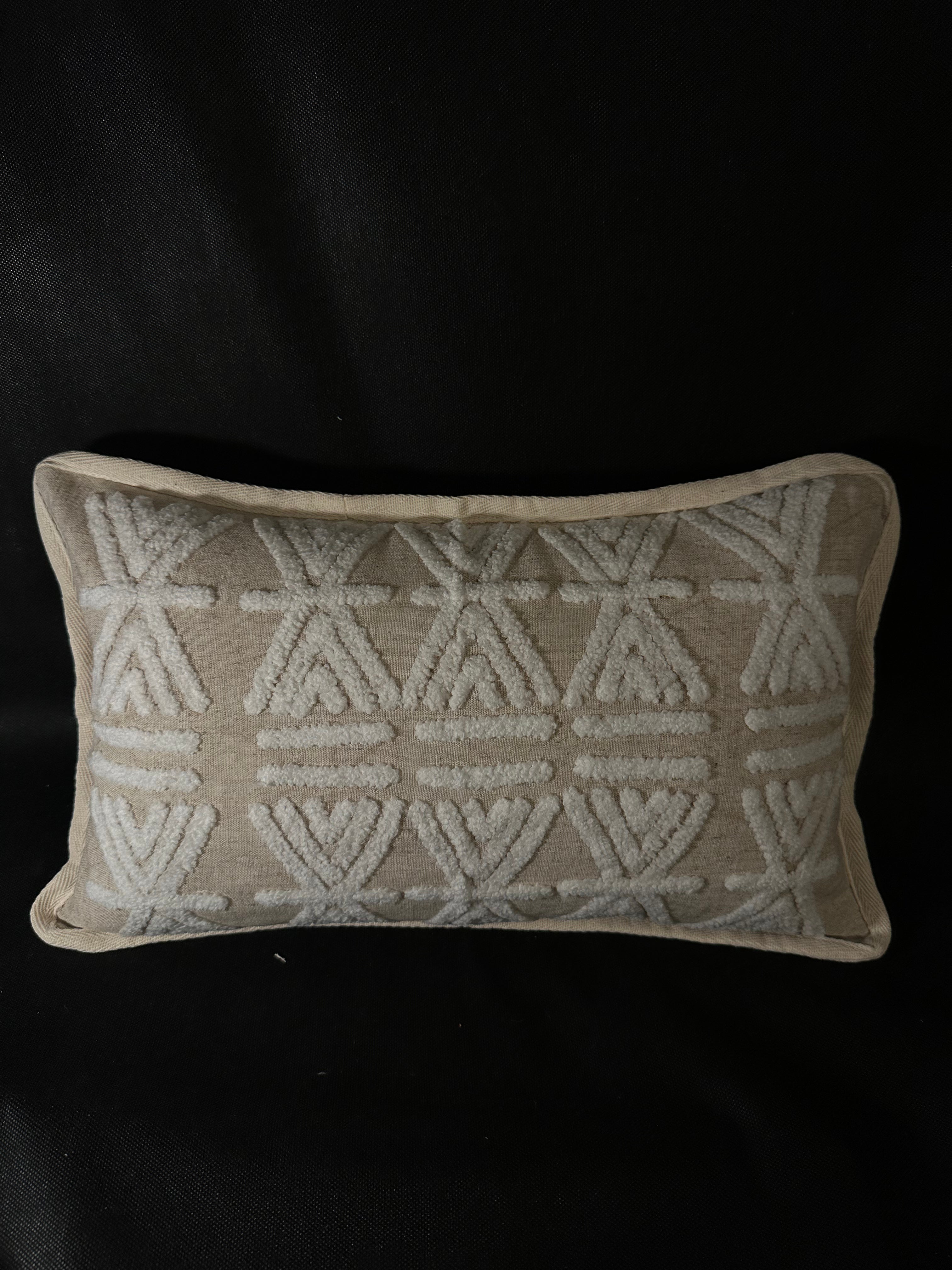 Taies de coussins beiges et blanches design