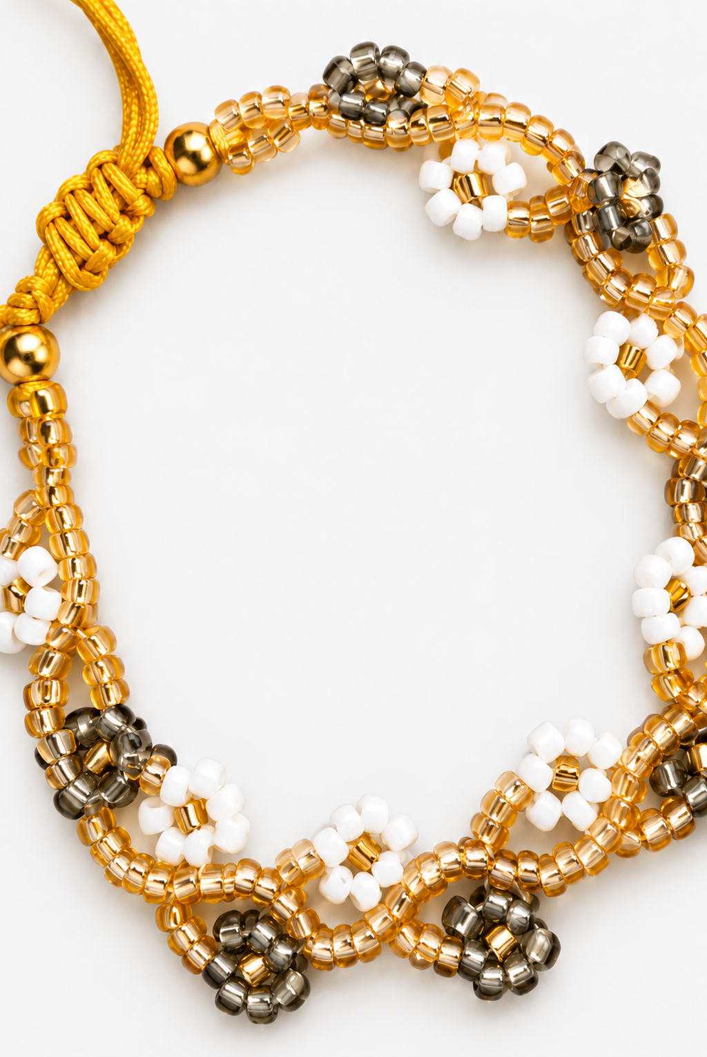 Bracelet fleurs blanc et gris